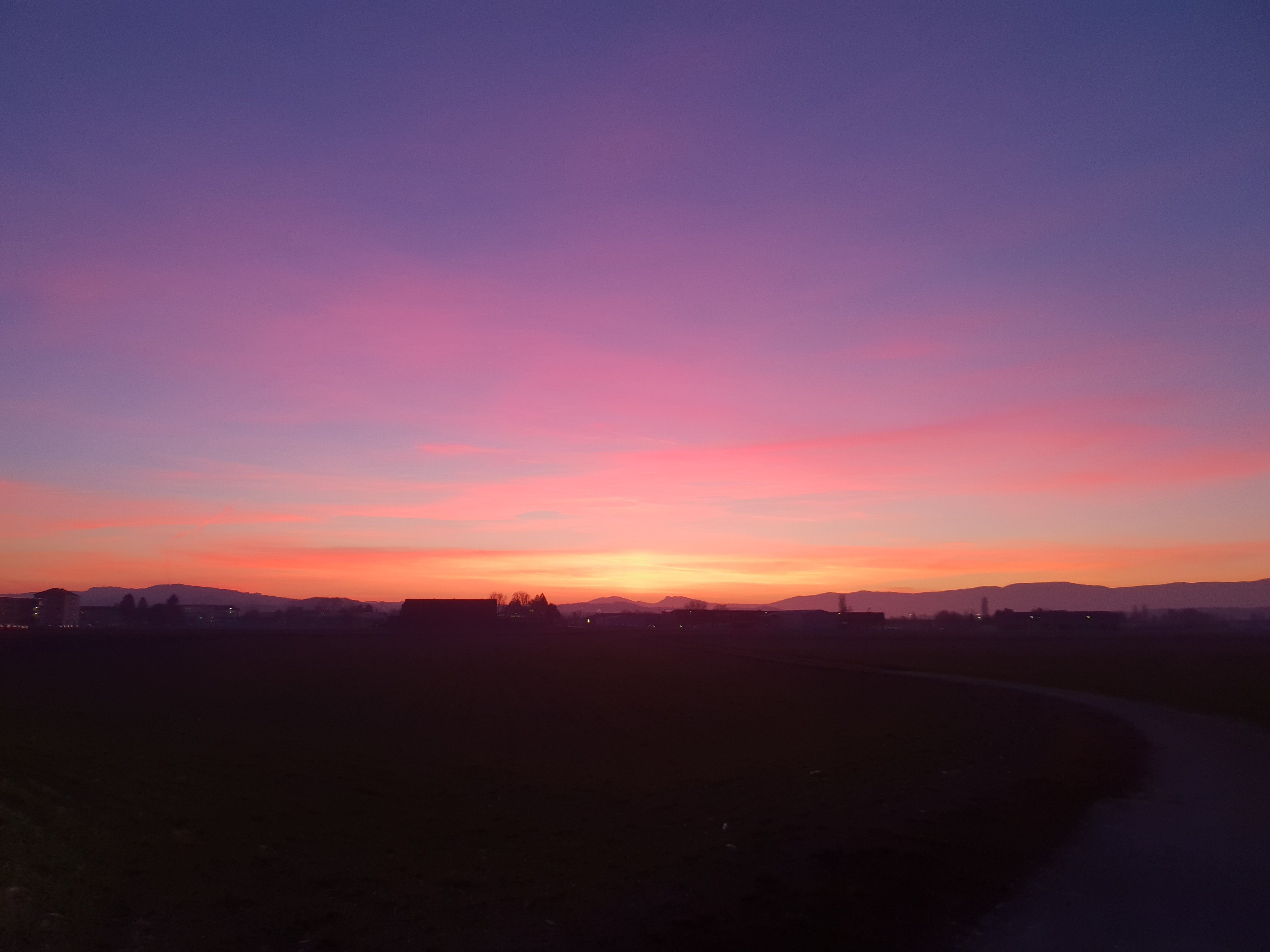 Coucher de soleil dans les tons roses et violets